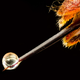 Image for article titled Feather scales, pollen grains, and a single teardrop: what photos of the microscopic world reveal